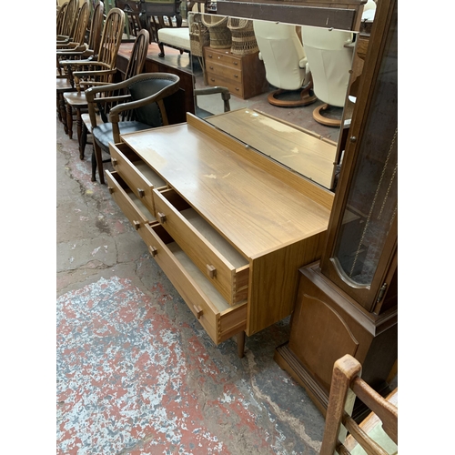 257 - A mid 20th century teak effect dressing table - approx. 116cm high x 122cm wide x 42cm deep