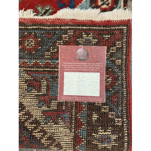 25A - A G.H. Frith Ltd. hand made Oriental rug - approx. 120cm x 72cm