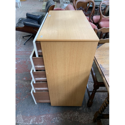 261 - A 1970s Schreiber beech effect and white laminate chest of drawers - approx. 94cm high x 75cm wide x... 