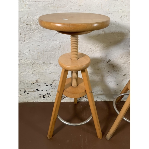 267 - Three modern beech adjustable bar stools - approx. 80cm high x 31cm diameter