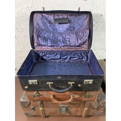 268 - Four early 20th century travel trunks - largest approx. 28cm high x 75cm wide x 47cm deep