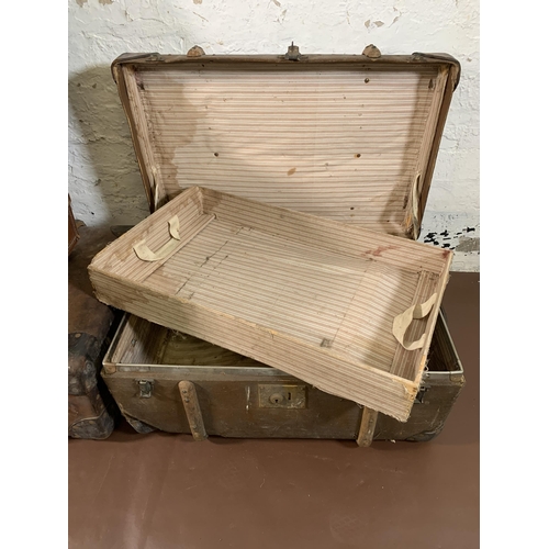 268 - Four early 20th century travel trunks - largest approx. 28cm high x 75cm wide x 47cm deep