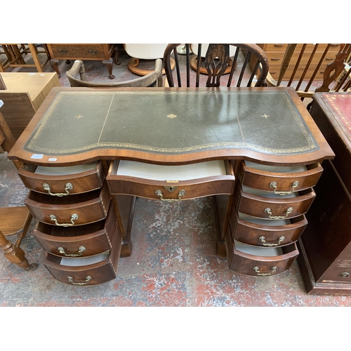 271 - A Bevan Funnell Ltd Reprodux mahogany and green leather serpentine pedestal writing desk - approx. 7... 