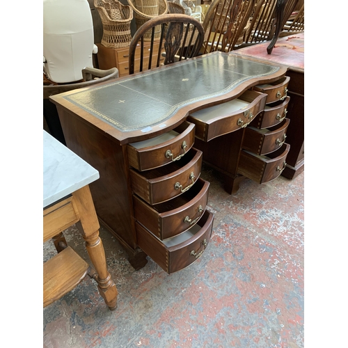 271 - A Bevan Funnell Ltd Reprodux mahogany and green leather serpentine pedestal writing desk - approx. 7... 