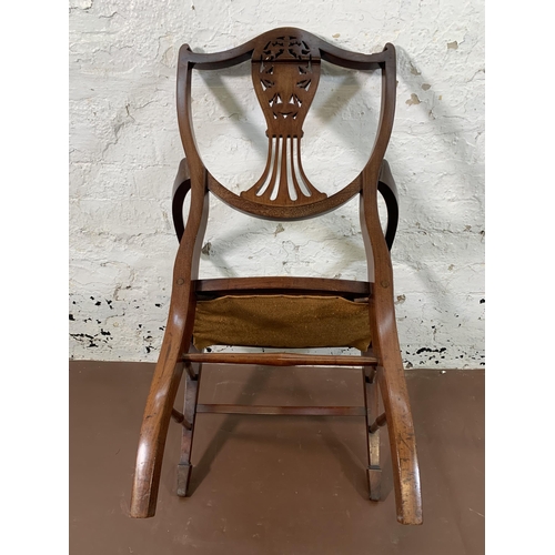 272 - An Edwardian Sheraton Revival carved mahogany and green fabric upholstered armchair - approx. 85cm h... 