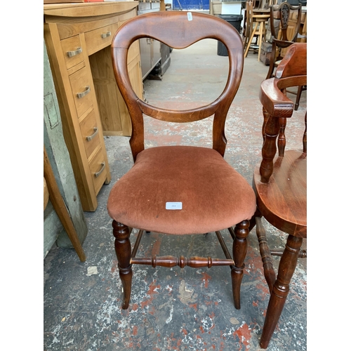 284 - Two chairs, one Victorian stained beech and red fabric upholstered balloon back and one stained beec... 