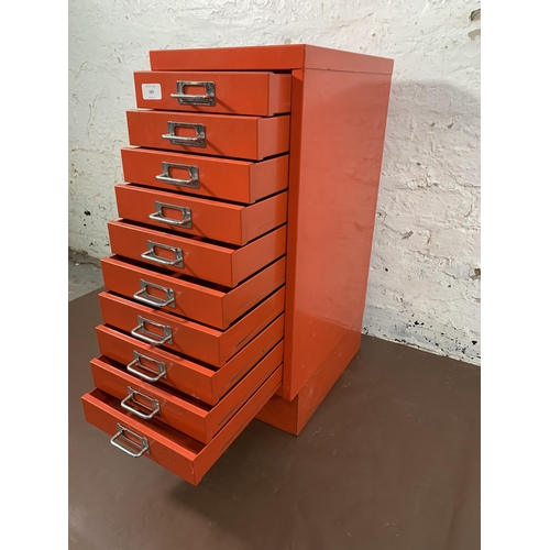 289 - A red metal ten drawer office filing cabinet - approx. 71cm high x 28cm wide x 41cm deep