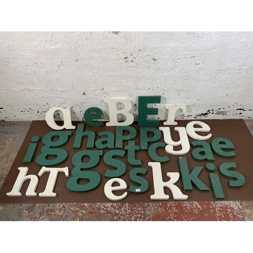 299 - A collection of painted MDF wall hanging letters