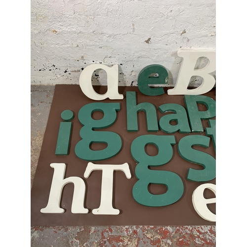 299 - A collection of painted MDF wall hanging letters