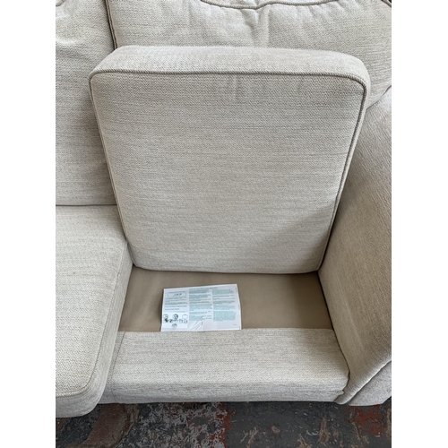 300E - A Marks & Spencer Balfour beige fabric upholstered three seater sofa - approx. 73cm high x 178cm wid... 