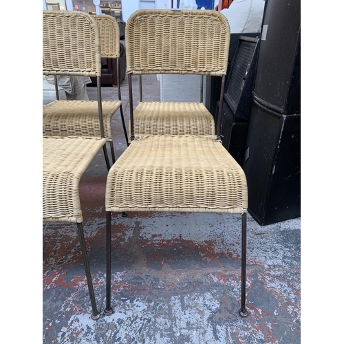 300G - Four wicker and tubular metal patio chairs