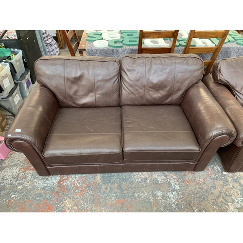 300N - A Marks & Spencer brown leather two piece lounge suite comprising three seater sofa and armchair