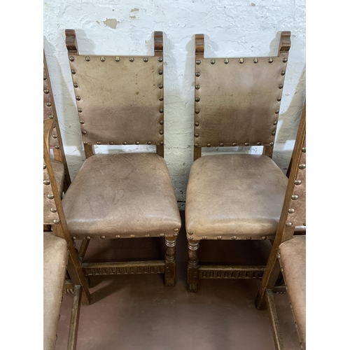 300O - Eight Cromwellian style carved oak and brown leatherette upholstered dining chairs