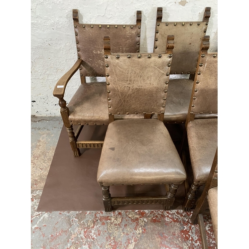 300O - Eight Cromwellian style carved oak and brown leatherette upholstered dining chairs