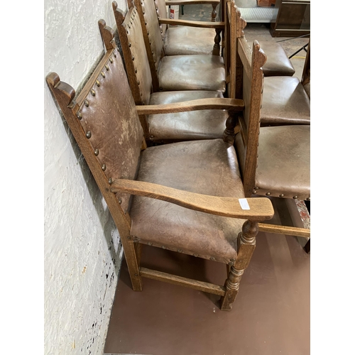 300O - Eight Cromwellian style carved oak and brown leatherette upholstered dining chairs