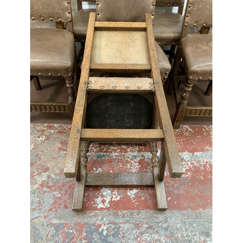 300O - Eight Cromwellian style carved oak and brown leatherette upholstered dining chairs