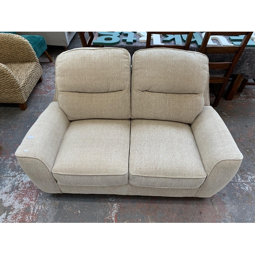 300P - A modern fabric upholstered two seater sofa