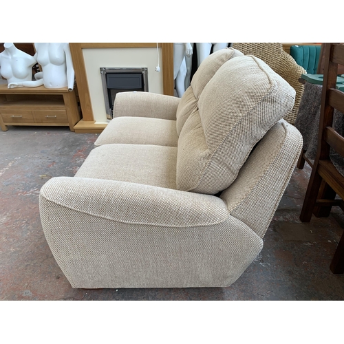 300P - A modern fabric upholstered two seater sofa