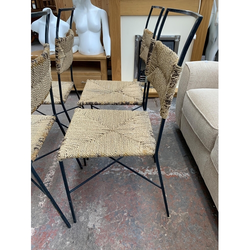 300Q - Four wicker and metal patio chairs