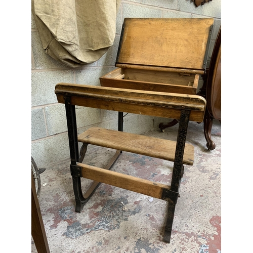 35 - An early 20th century beech and wrought iron school desk - approx. 74cm high x 63cm wide x 80cm deep