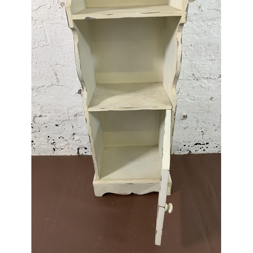 72 - A modern French style white painted clock bookcase - approx. 170cm high x 36cm wide x 26cm deep