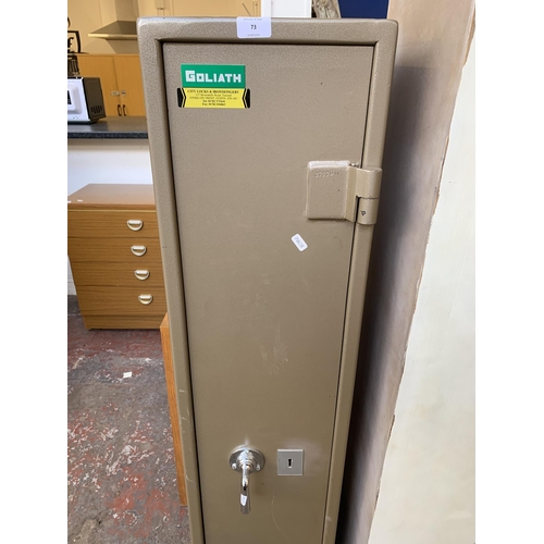 73 - A Goliath metal gun cabinet (key in office) - approx. 145cm high x 30cm wide x 28cm deep