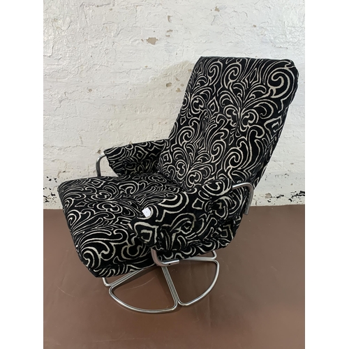 74 - A mid 20th century chrome plated and fabric upholstered swivel armchair - approx. 93cm high x 67cm w... 