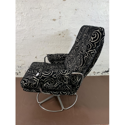 74 - A mid 20th century chrome plated and fabric upholstered swivel armchair - approx. 93cm high x 67cm w... 