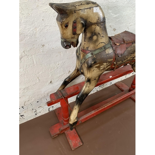 79 - A Victorian Frederick Roebuck & Sons of Australia hand painted dapple grey rocking horse on red pain... 