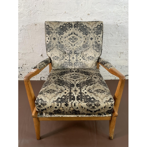 86 - A mid 20th century Cintique beech and fabric upholstered armchair - approx. 83cm high x 63cm wide x ... 