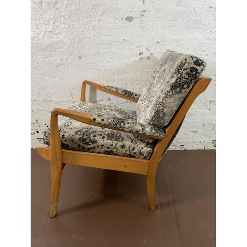 86 - A mid 20th century Cintique beech and fabric upholstered armchair - approx. 83cm high x 63cm wide x ... 