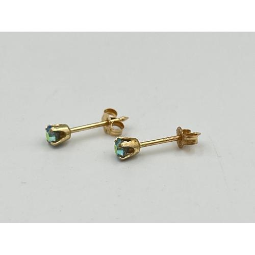 Three earrings, two Studex 14ct gold and gemstone stud earrings and one ...