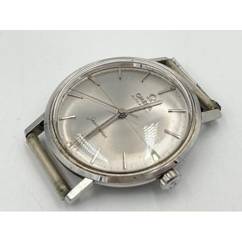 2293 - A mid 20th century Omega Seamaster automatic men's wristwatch with sunburst and crosshair dial, arro... 