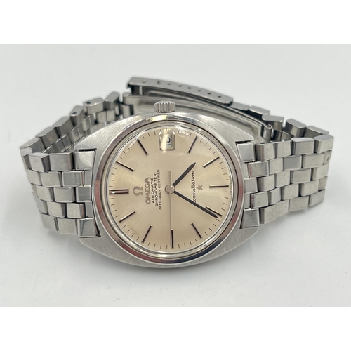 A 1970s Omega Constellation automatic 35mm wristwatch with 'C' case, sunburst dial, date window and original Omega ref. 1040 stainless steel bracelet