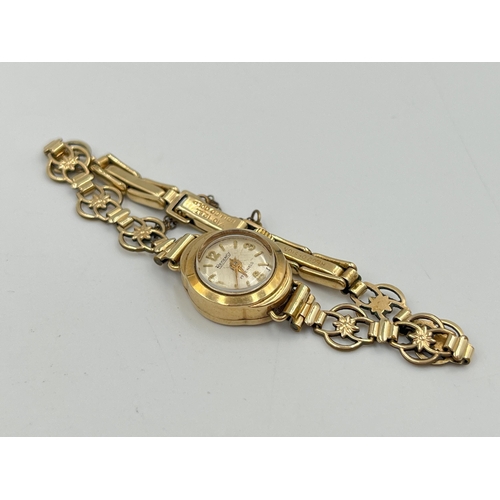 2300 - A mid 20th century hallmarked 9ct gold cased Regency mechanical lady's wristwatch on rolled gold bra... 