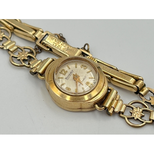 2300 - A mid 20th century hallmarked 9ct gold cased Regency mechanical lady's wristwatch on rolled gold bra... 