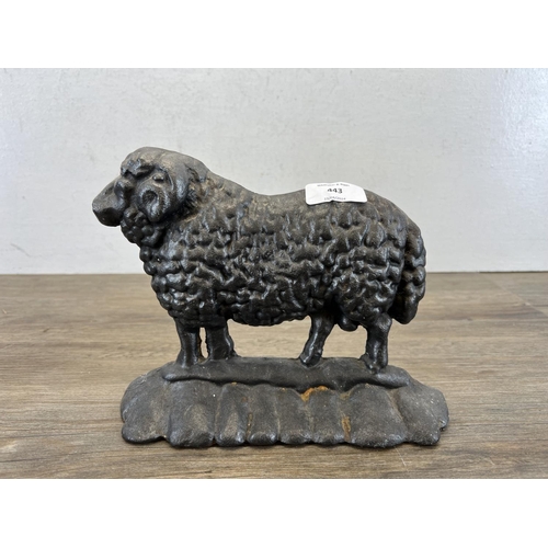 443 - A pair of 19th century style cast iron ram doorstops - approx. 19cm high x 24cm long