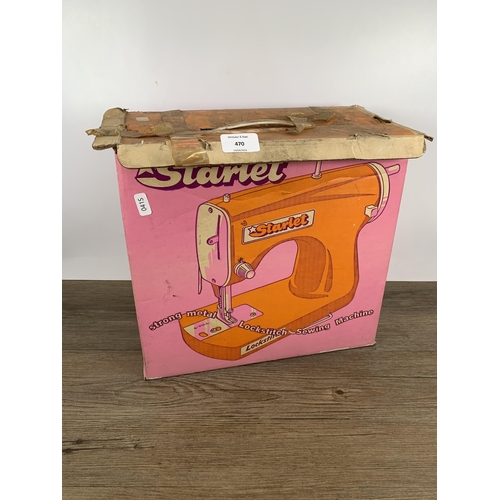 470 - A vintage boxed Starlet child's sewing machine