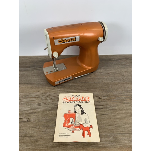 470 - A vintage boxed Starlet child's sewing machine