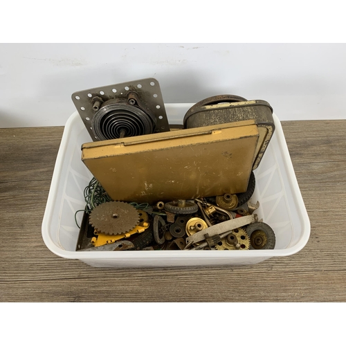 474 - A 19th century stained pine box containing a large collection of Meccano parts and accessories