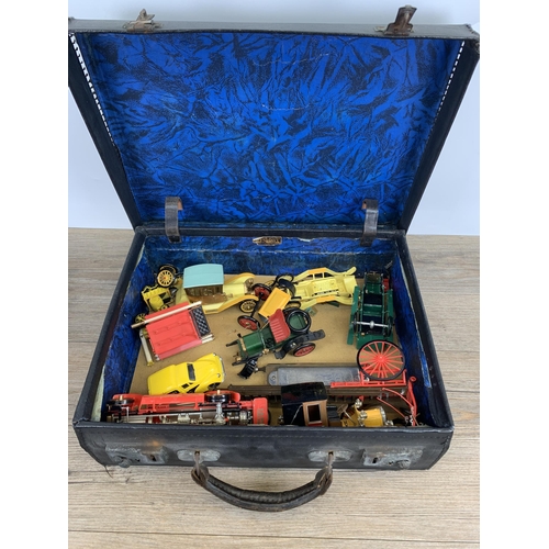 479 - A collection of vintage toys and games to include diecast model vehicles, Monopoly board game, playi... 