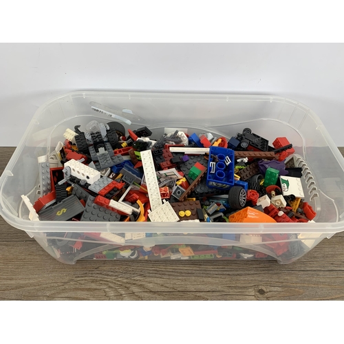 497 - Two boxes containing a collection of Lego, K'Nex and Mega Bloks