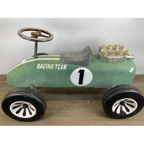 498 - A mid 20th century style Great Gizmos Limited green metal child's push along car