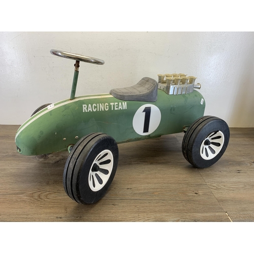 498 - A mid 20th century style Great Gizmos Limited green metal child's push along car