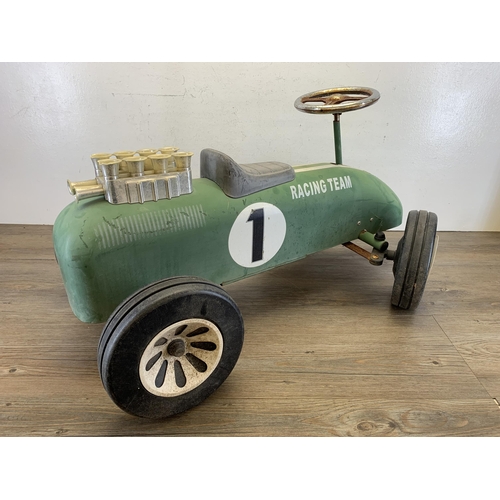 498 - A mid 20th century style Great Gizmos Limited green metal child's push along car