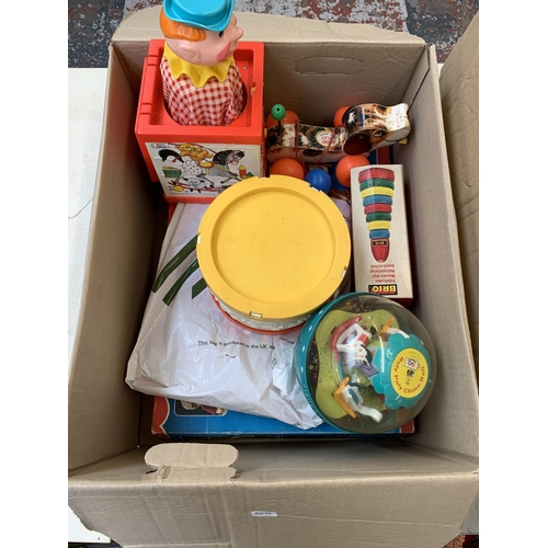 500 - Two boxes containing a collection of vintage toys to include Fisher Price Little Snoopy, Brio Ring P... 