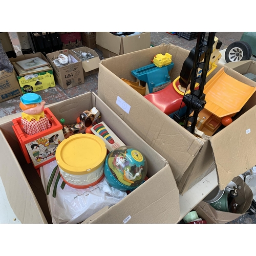 500 - Two boxes containing a collection of vintage toys to include Fisher Price Little Snoopy, Brio Ring P... 