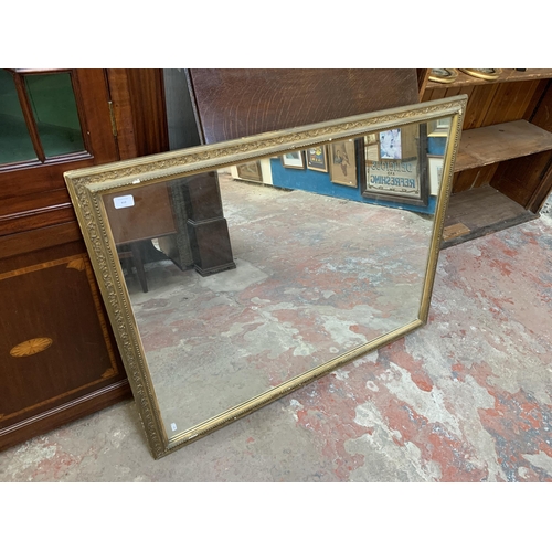 612 - A late 19th century gilt framed wall mirror - approx. 91cm high x 115cm wide