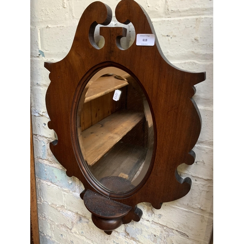 618 - A Georgian style mahogany frame bevelled edge wall mirror - approx. 62cm high x 42cm wide