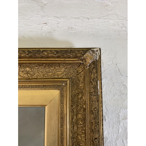 624 - A late 19th/early 20th century gilt framed oil on canvas portrait of a gentleman bearing stamp 